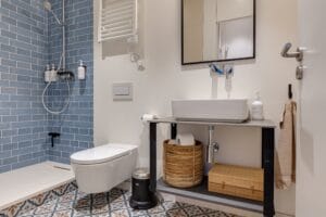 Bathroom with blue tiles