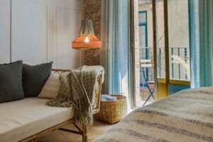 Montella Rattan sofa apartment Barcelona bedroom