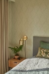 Villefranche apartment holiday home bedroom bed headboard lamp pillows nightstand