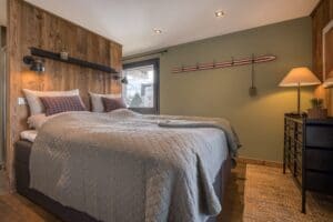 Megeve chalet apartment bedroom Au Maison pillows Trademark living shelf Ellos bedspread