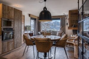 Megeve Chalet apartment Trademark Living dining table House Doctor chair Normann Copenhagen lamp