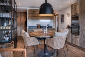 Megeve Chalet apartment Trademark Living dining table House Doctor chair Normann Copenhagen lamp