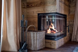 Megeve chalet living room fireplace recycled wood