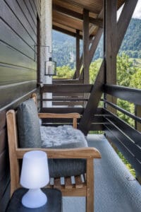 Megeve chalet balcony view nature furniture